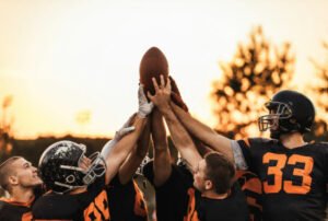 NFL Player holding the ball