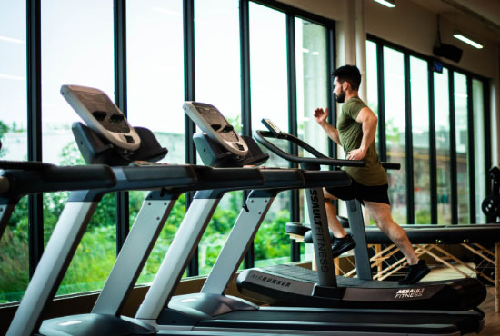 a man exercising on treadmill